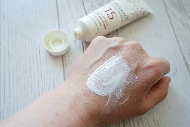 organii spf15 facial sun cream texture - cream spread onto the back of my hand